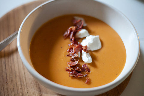 Simple vegan Pumpkin Soup recipe with carrot and a delicious pair for your homemade flatbread 